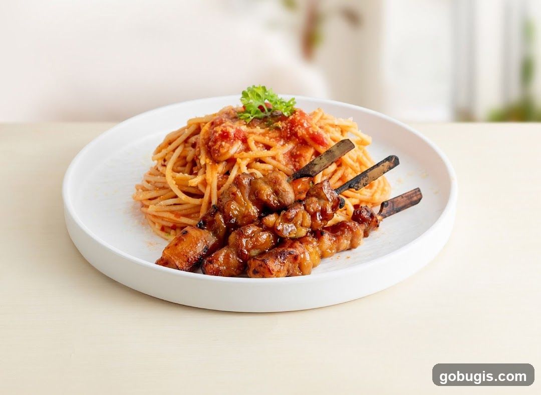 Spaghetti with Chicken Skewers