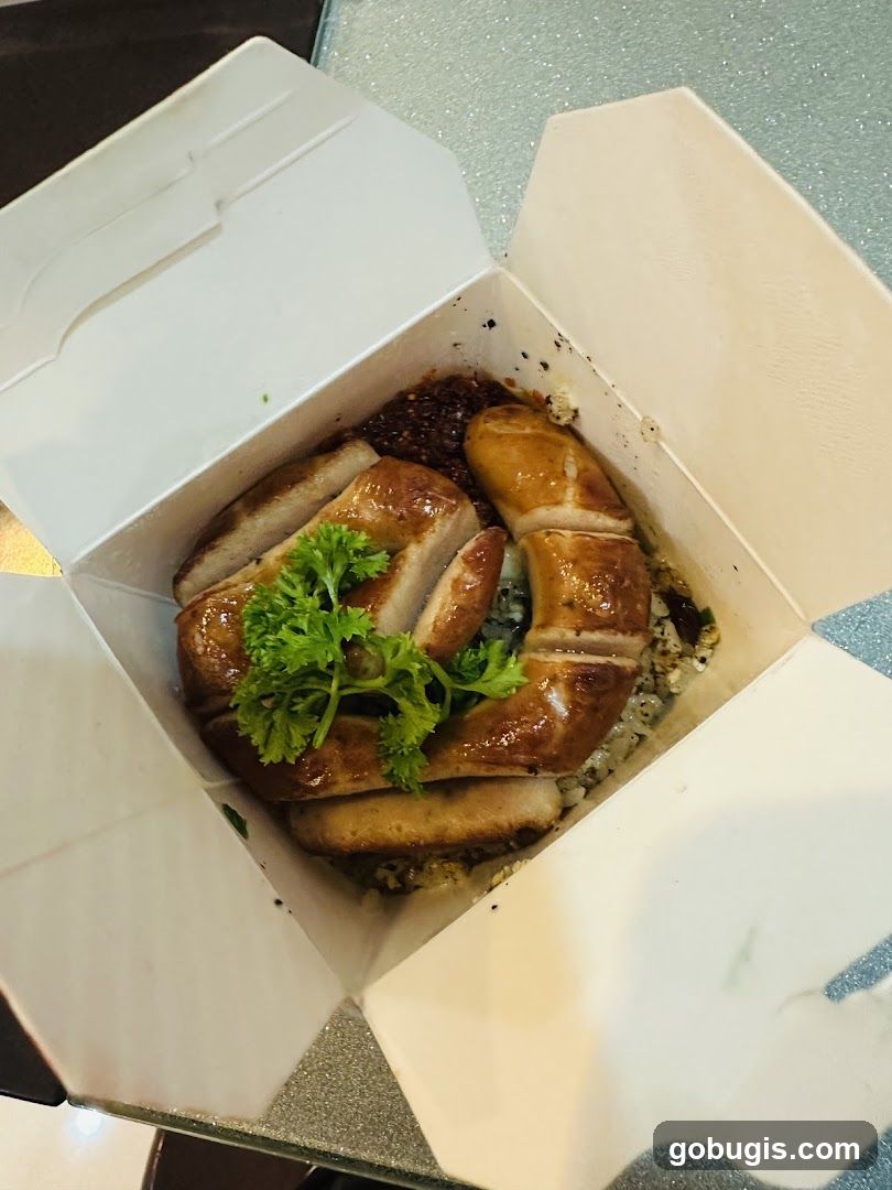 Takeout Box with Sliced Meat and Rice