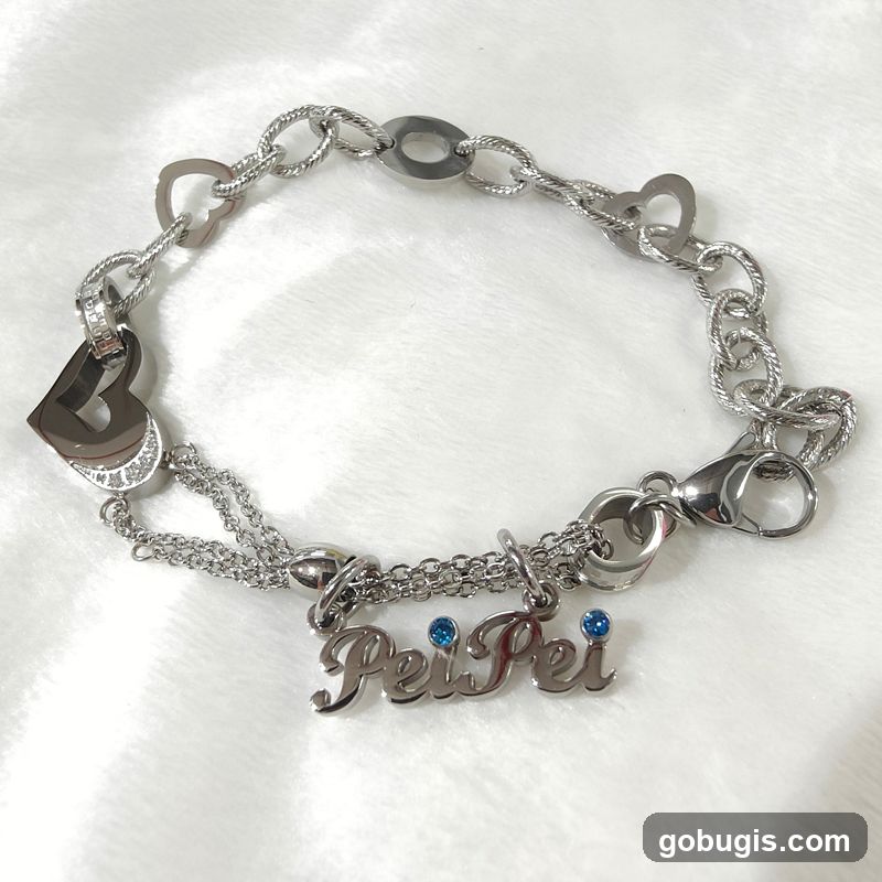 Silver bracelet with "Pei Pei" charm