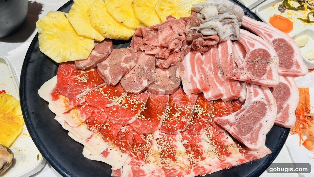 Assorted Raw Meats and Pineapple Slices