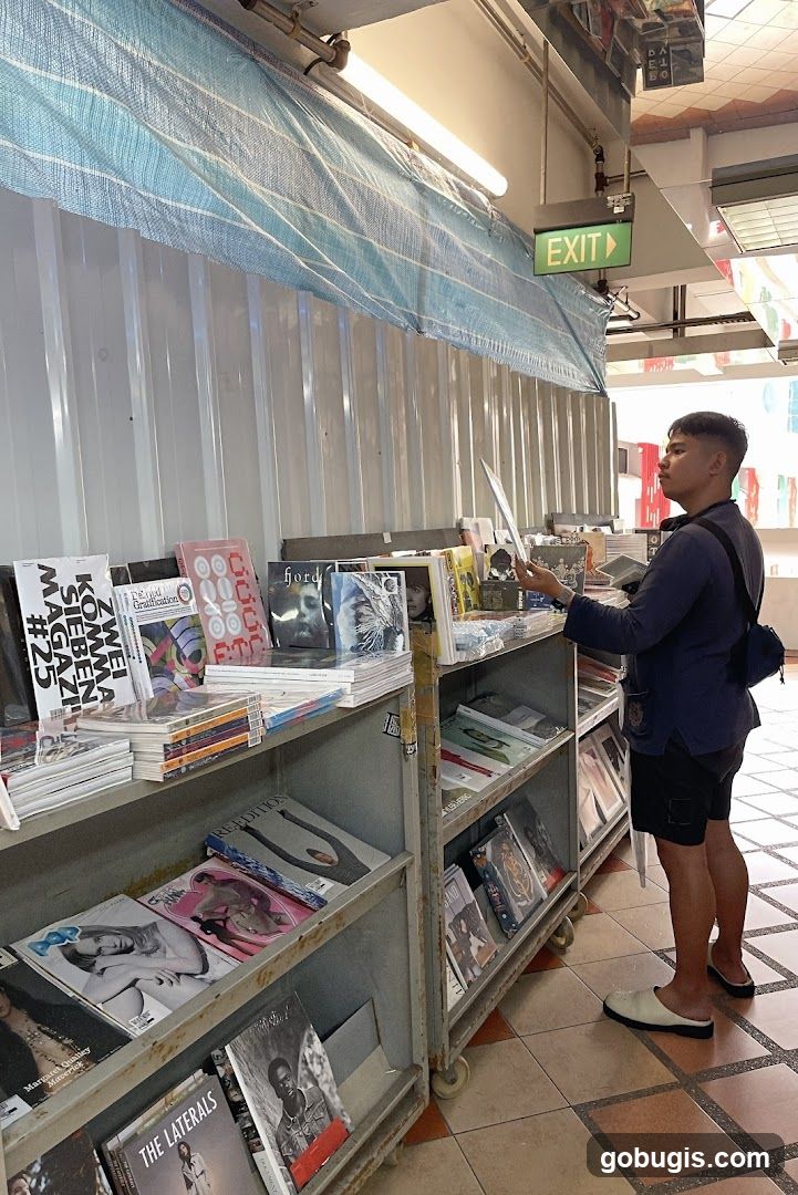 Person browsing magazines