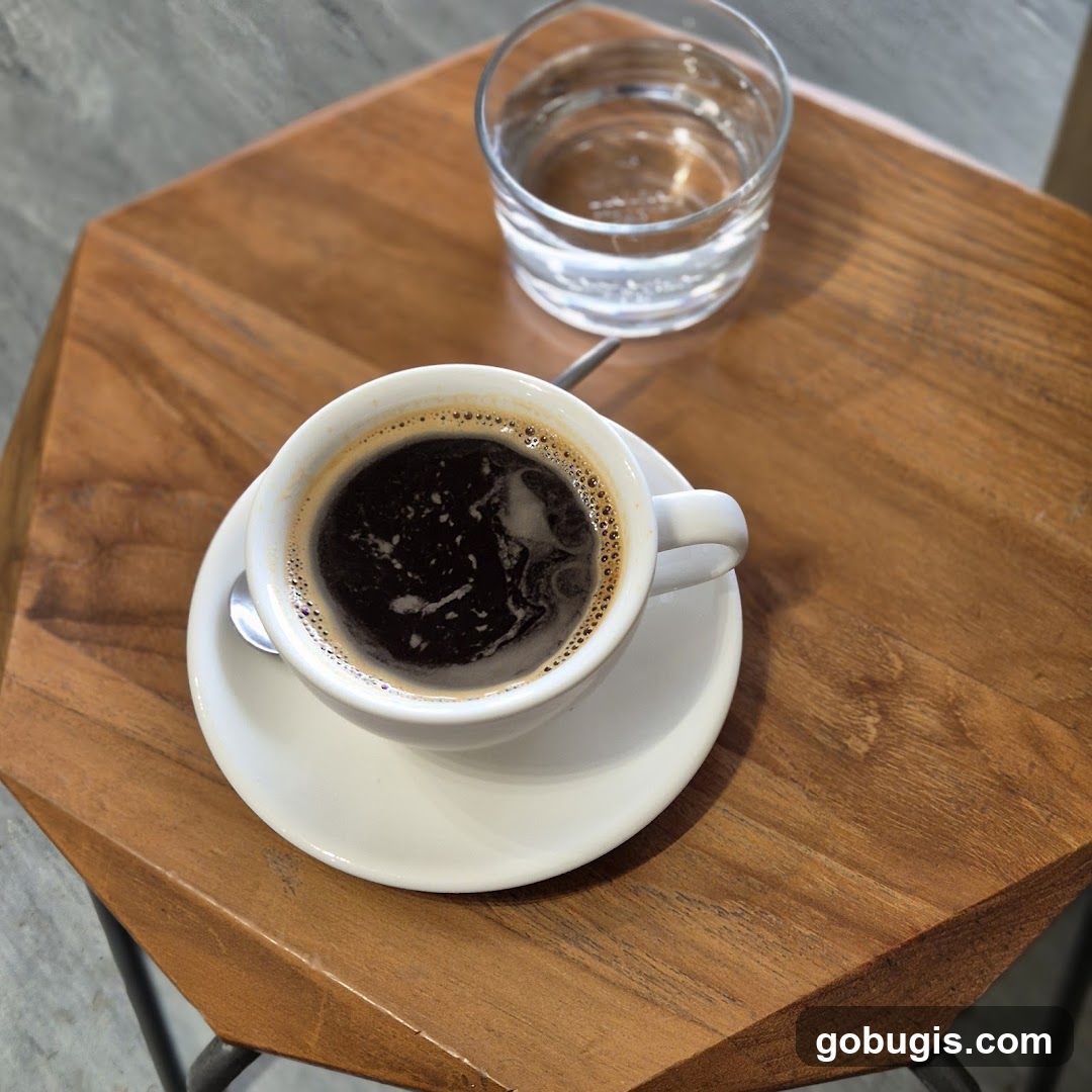 Coffee and Water on a Wooden Table