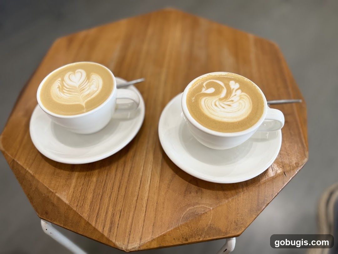 Two coffees with latte art