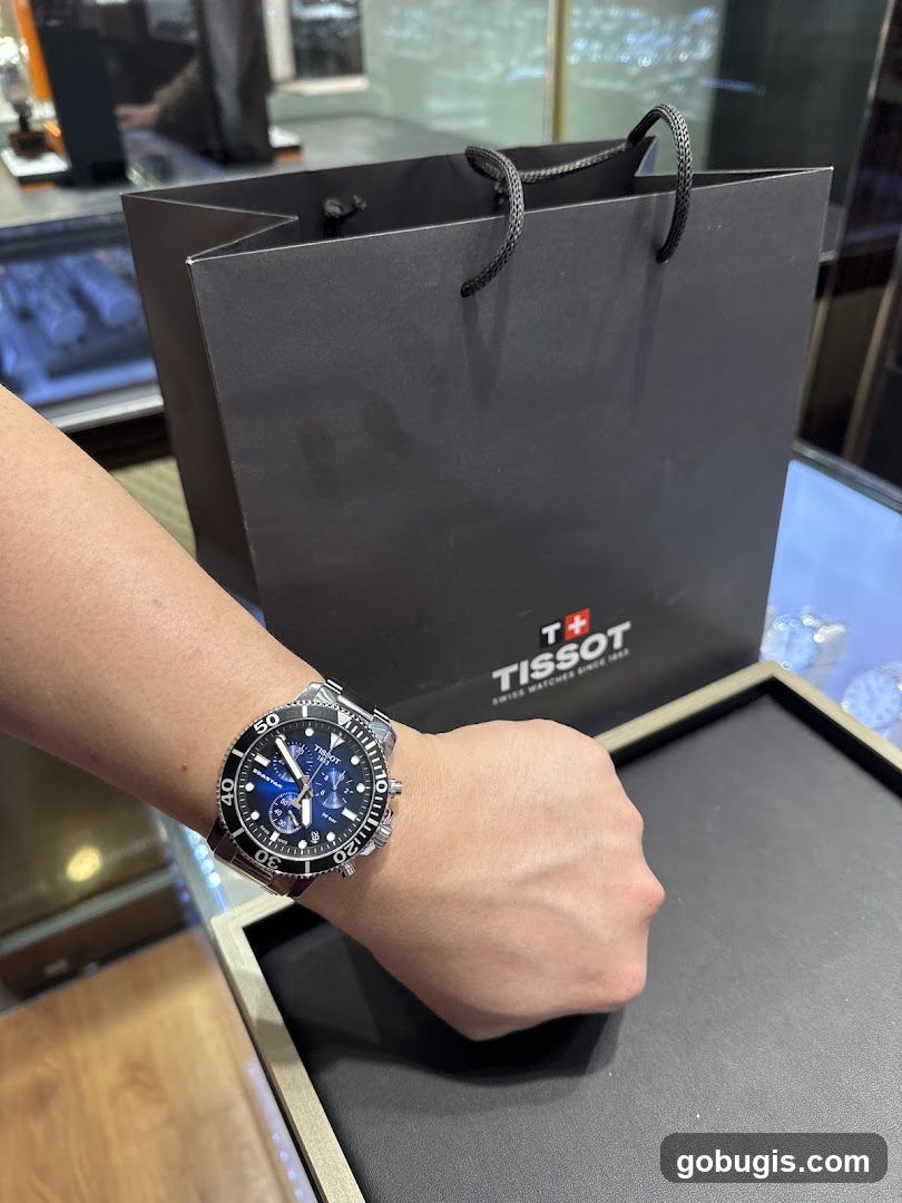 Tissot Watch and Shopping Bag