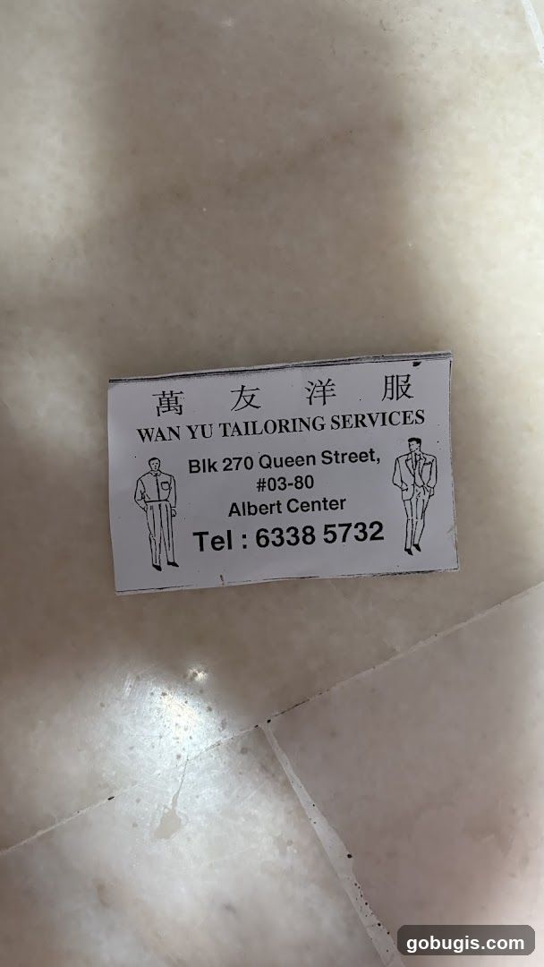 Wan Yu Tailoring Services Business Card