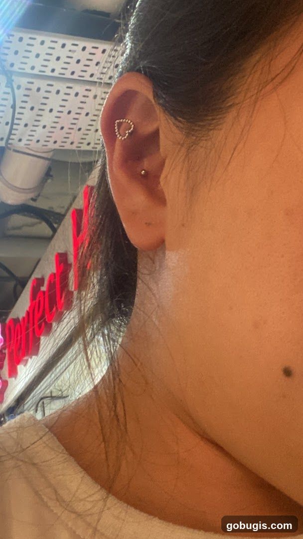Woman's Ear with Heart Earring