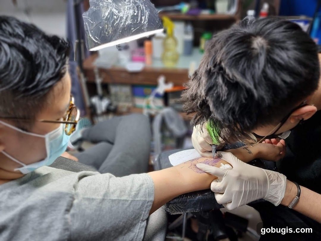 Tattoo Artist Working