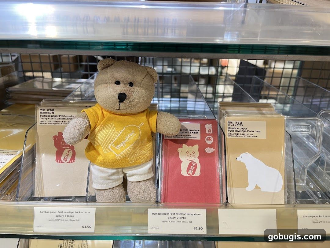 Teddy bear with Starbucks-themed shirt and stationery