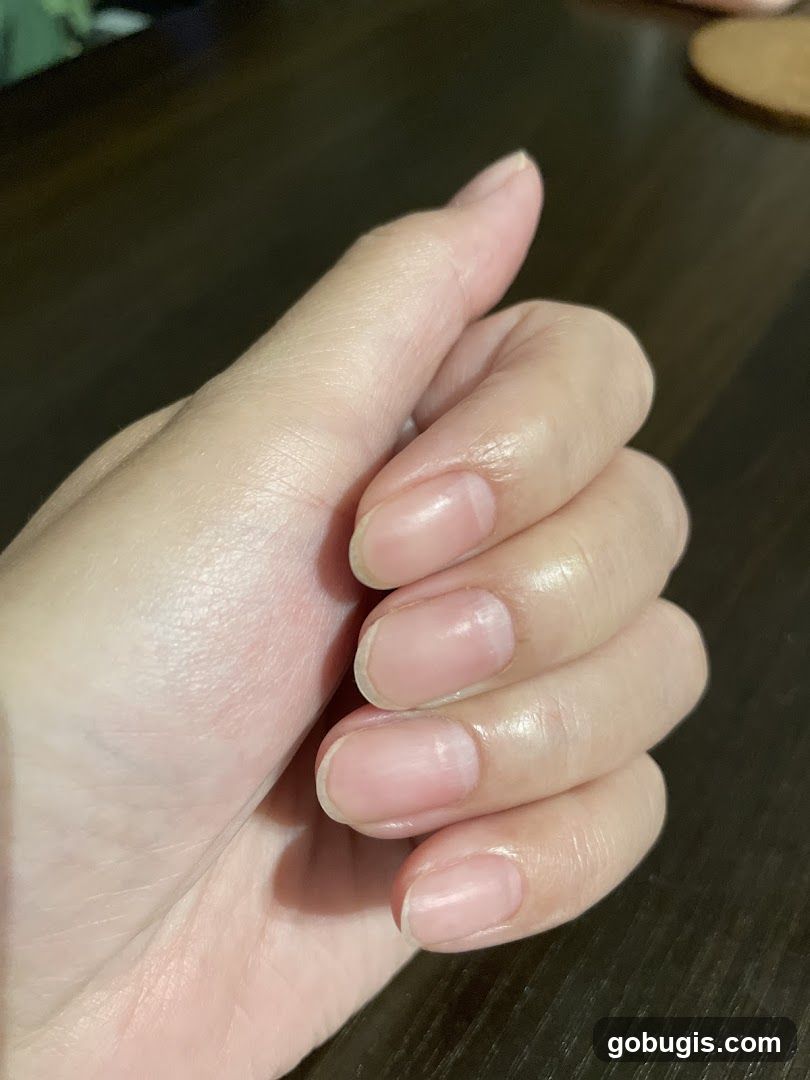 Close-up of a hand with natural nails