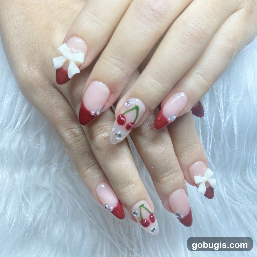 Nail Art with Cherry and Bow Design