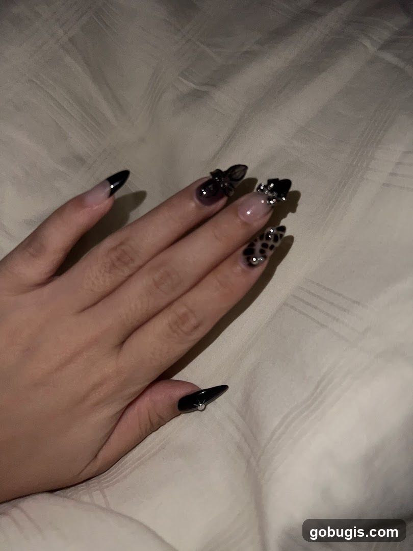 Nails with Black and Leopard Print Design