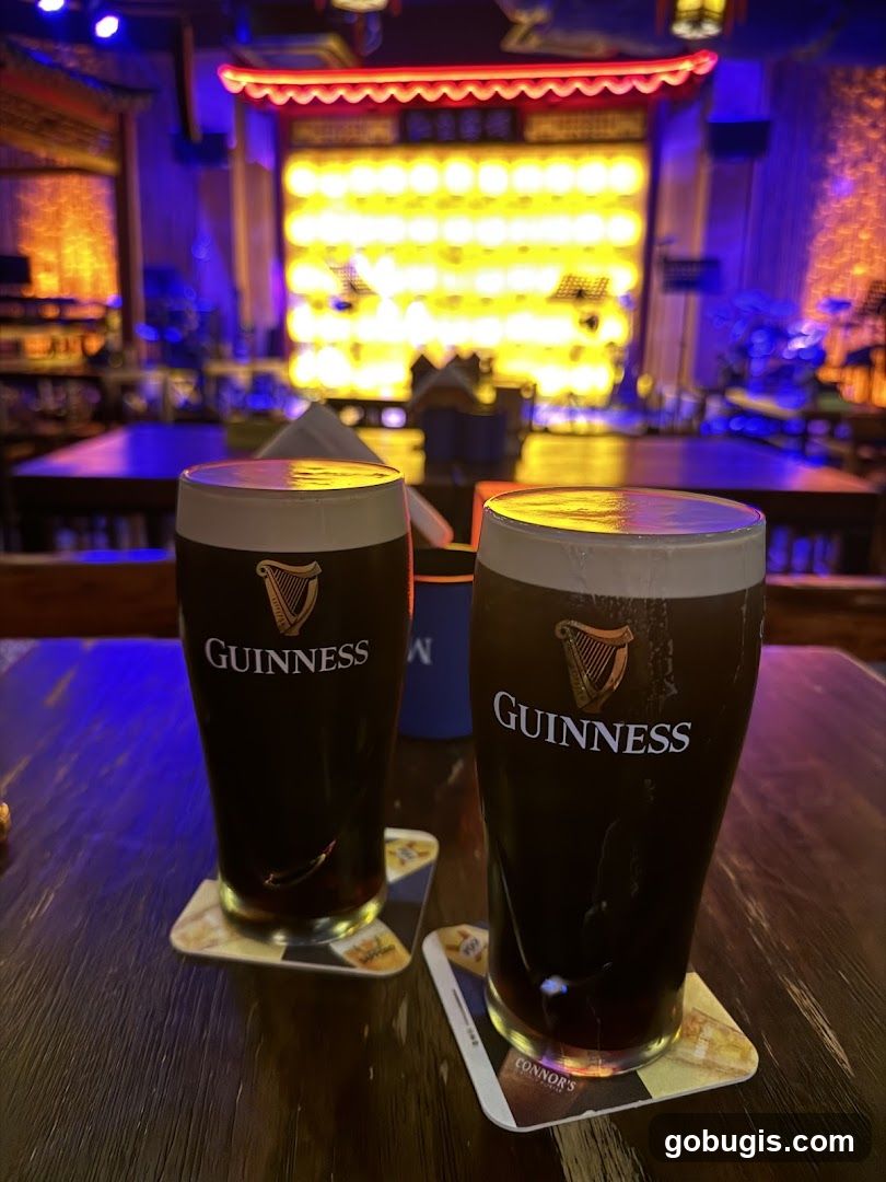 Two glasses of Guinness beer on a table