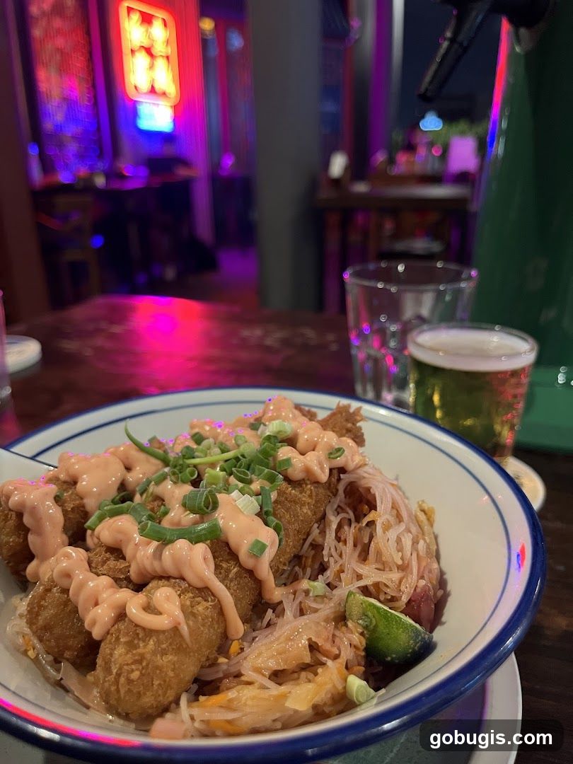 Fried Food Bowl with Sauce and Garnish