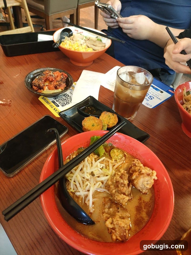 Table with Ramen and Appetizers