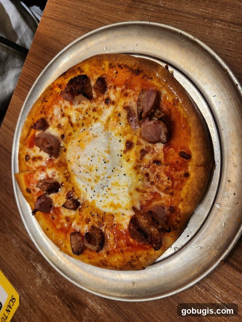 Pizza with Egg and Sausage