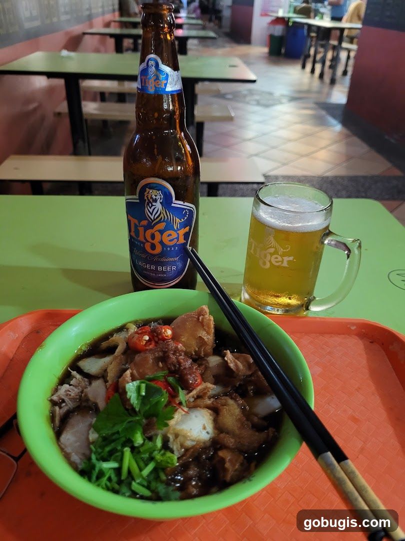 Bowl of noodles with beer