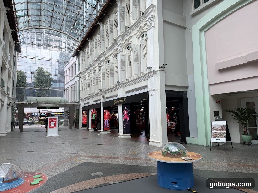 Outdoor walkway with shops and displays