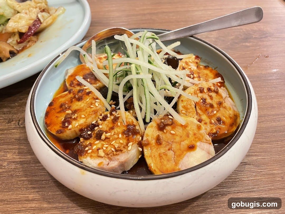Slices of Chicken with Sauce and Cucumber