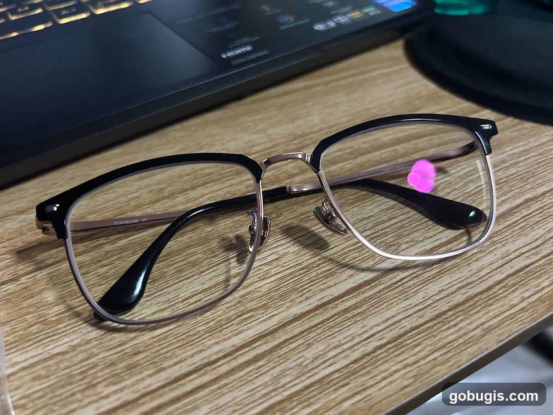 Eyeglasses on a Wooden Desk
