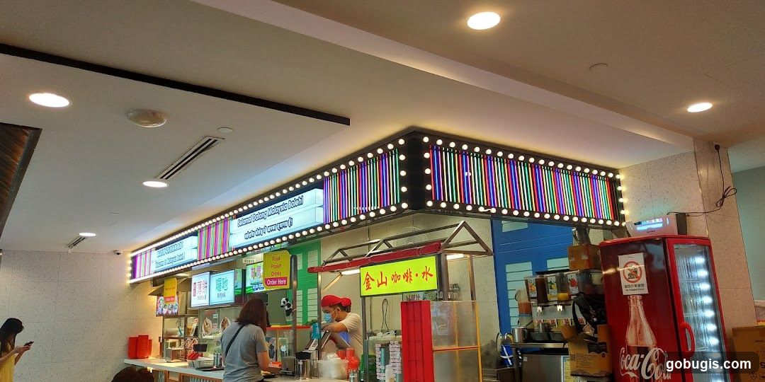Food stall with colorful lights