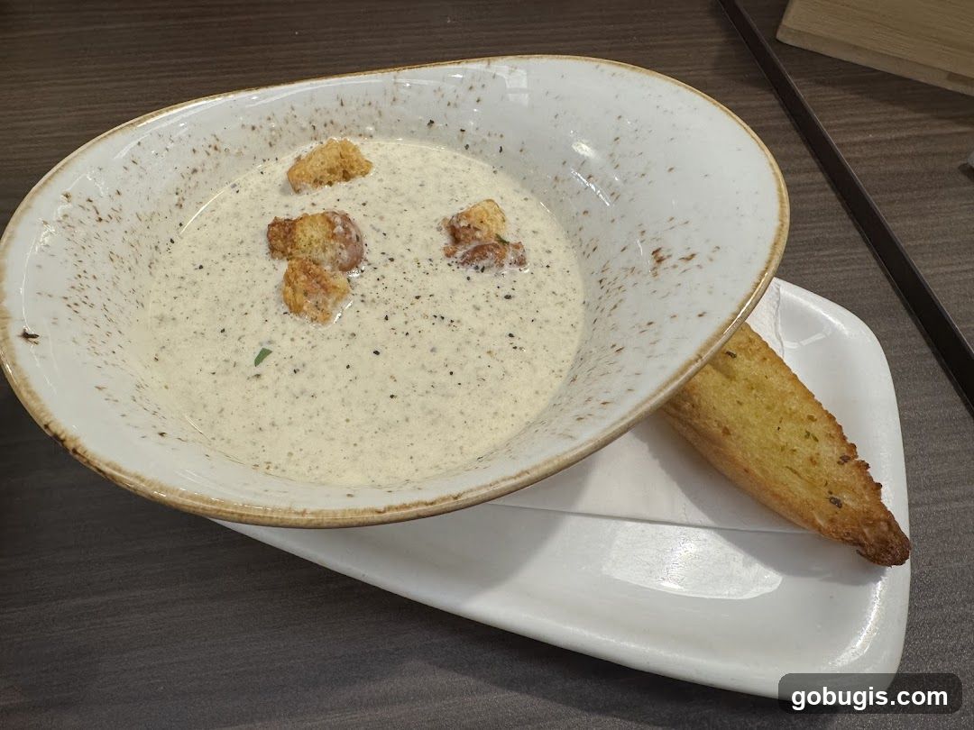 Creamy Soup with Croutons and Breadstick