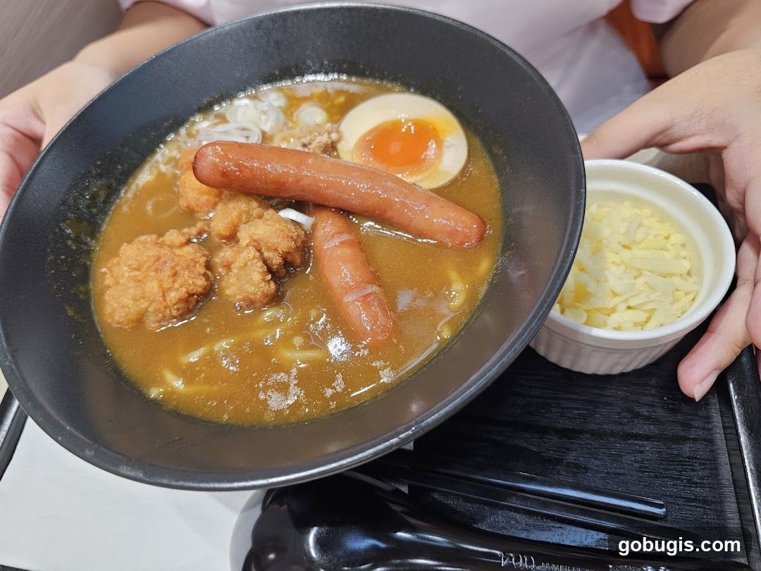 Curry Ramen with Sausages and Fried Chicken
