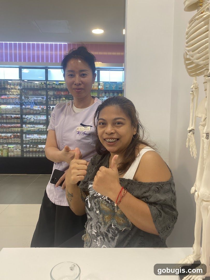 Two women and a skeleton model