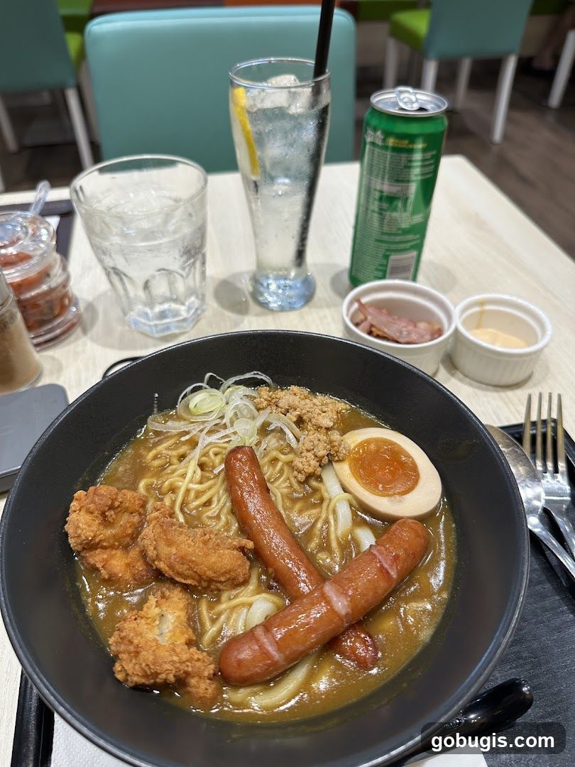 Curry Ramen with Sausages and Fried Chicken