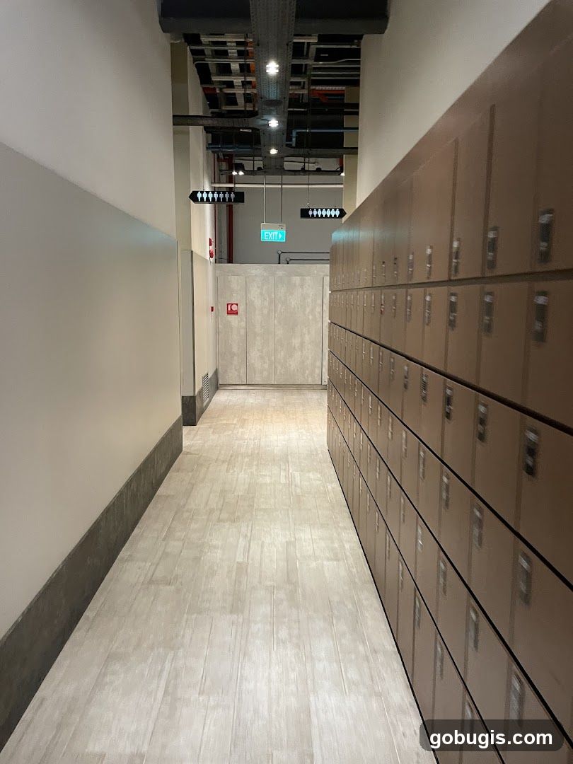 Hallway with Lockers and Restroom Signs
