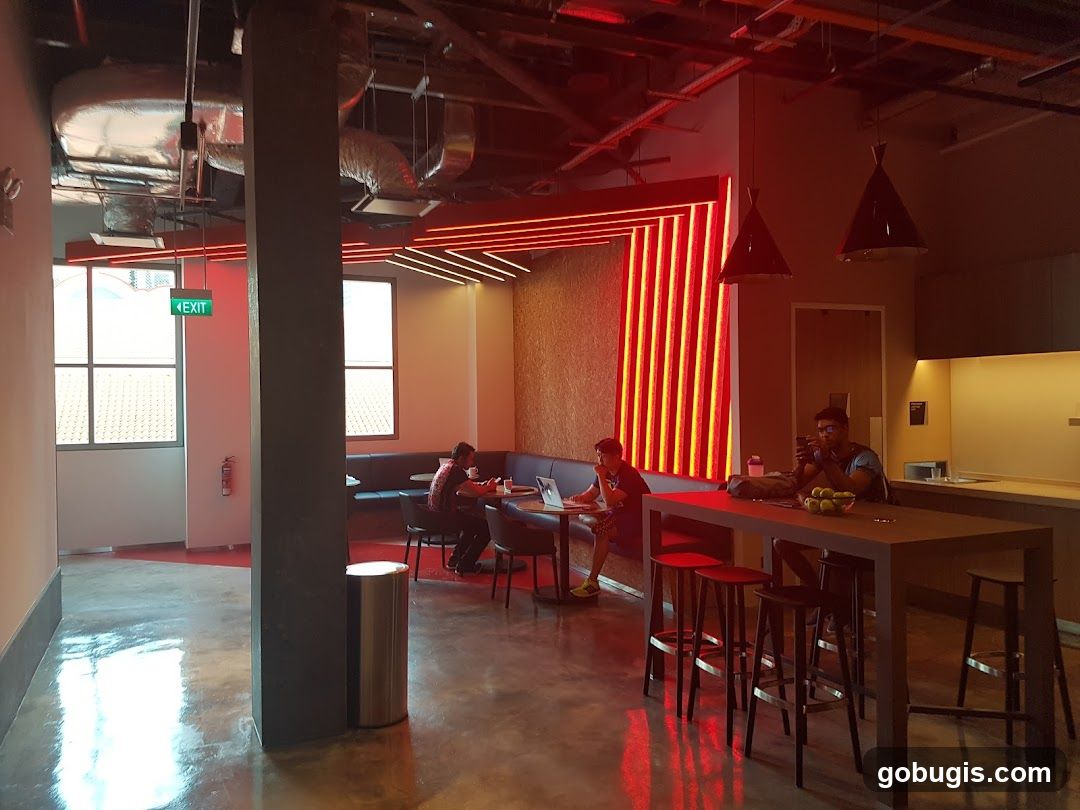 Modern Co-working Space with Red Neon Accents
