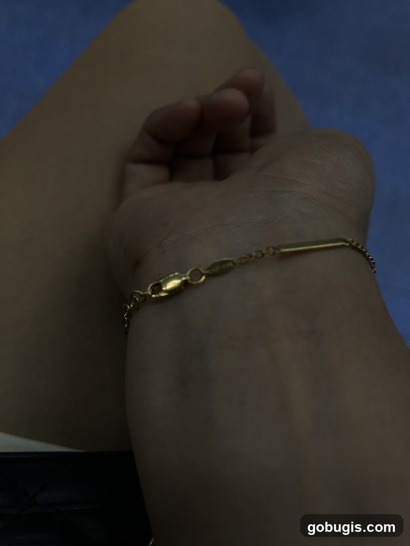 Gold Bracelet on Wrist