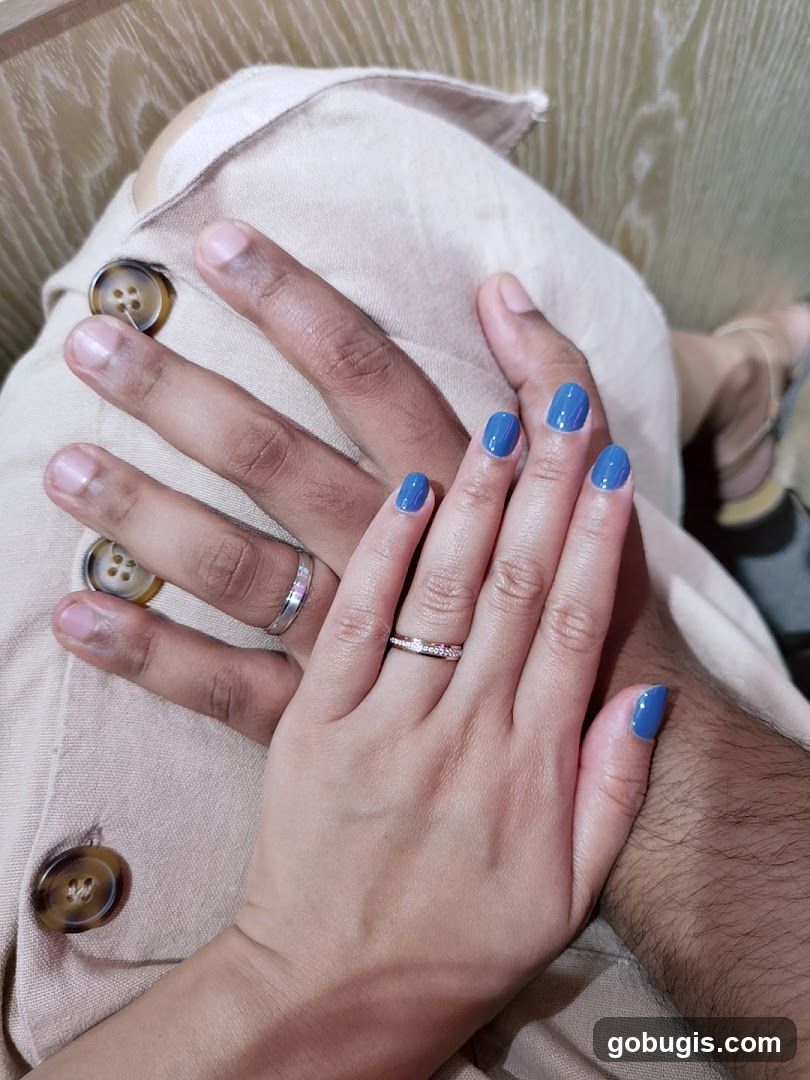 Couple's Hands with Rings