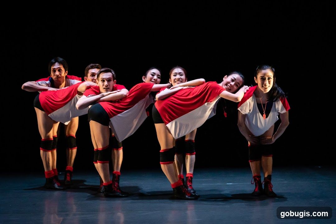 Dancers in Red and White Outfits