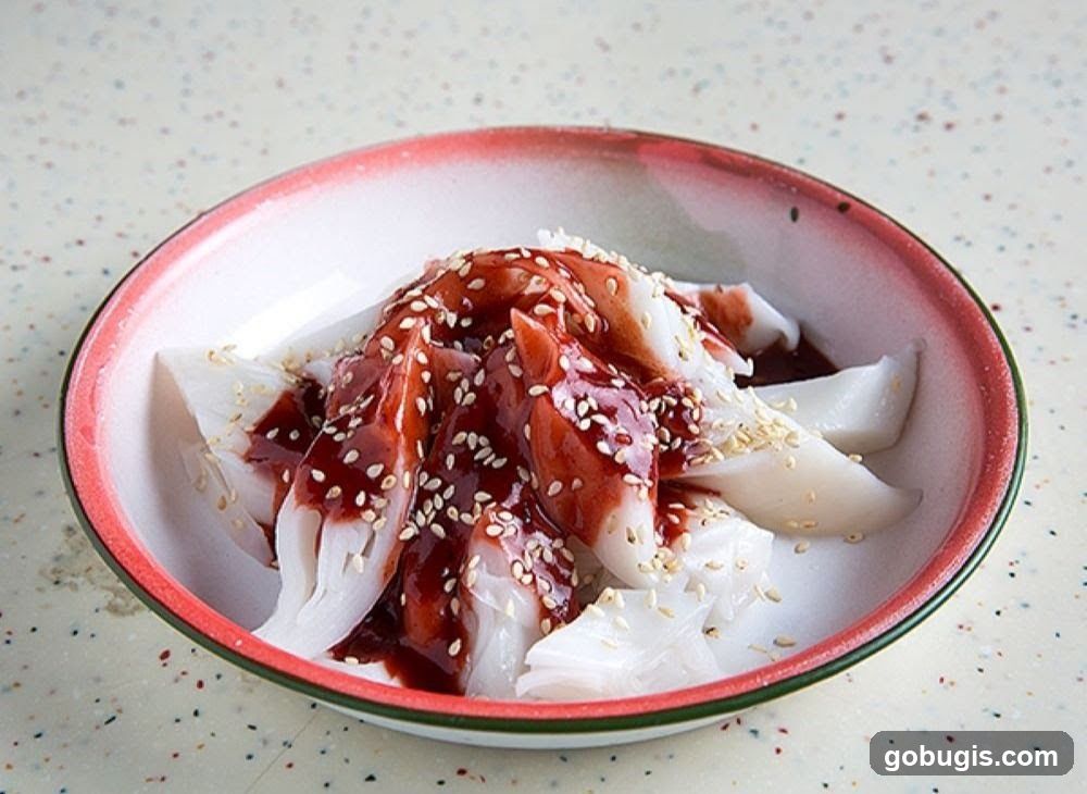 Rice Noodle Rolls with Sauce and Sesame Seeds
