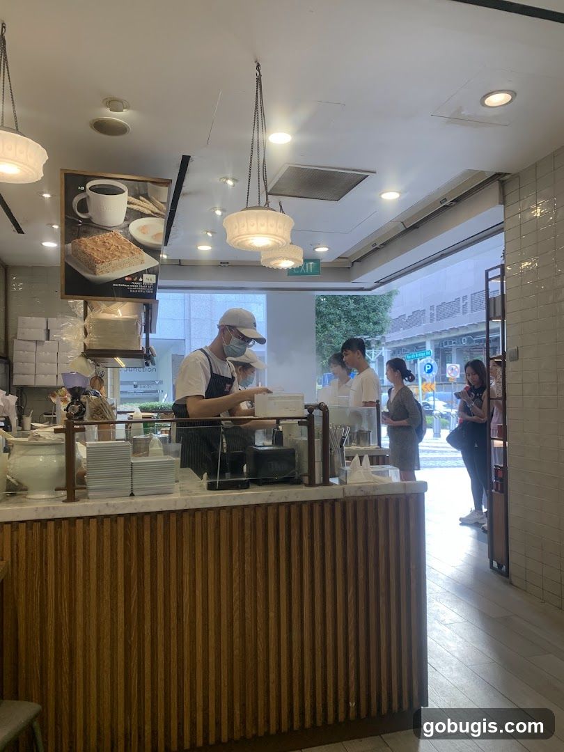 Cafe Counter with Staff and Customers