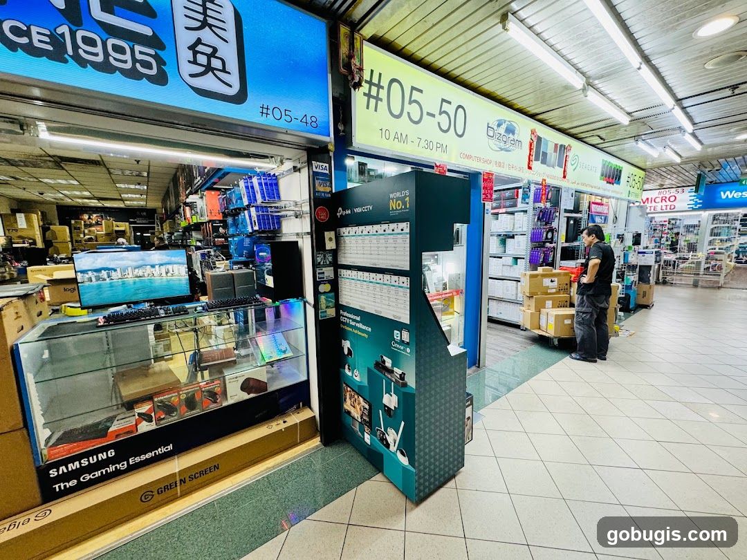 Computer shop interior with electronics on display