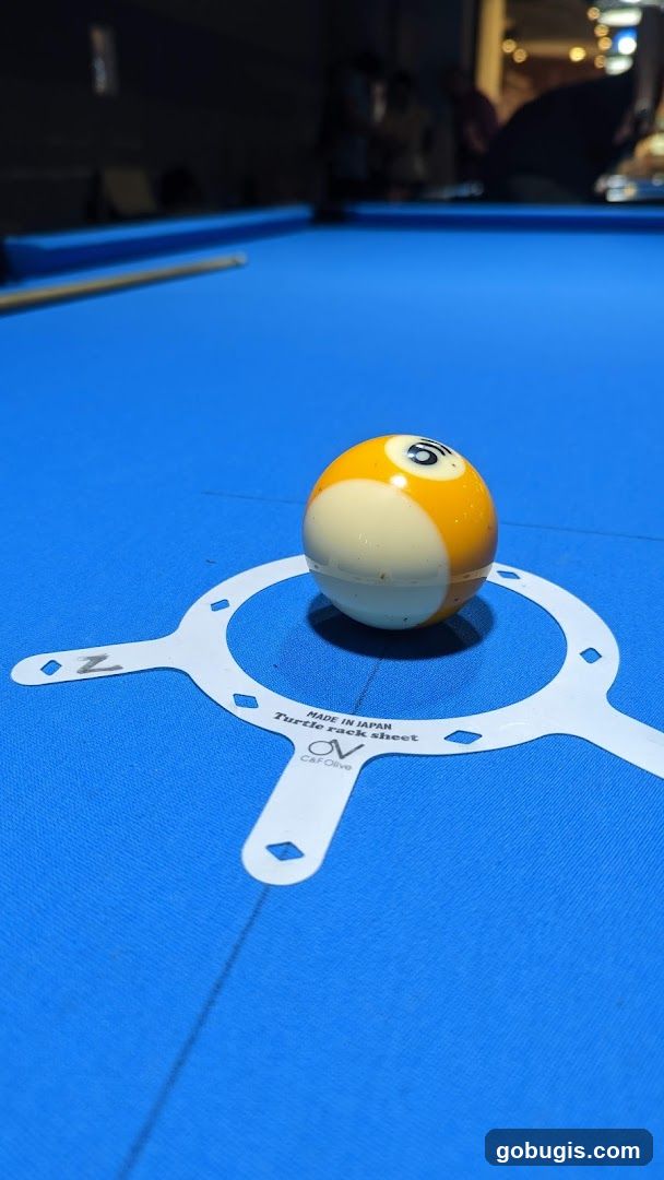 Billiard ball on rack sheet