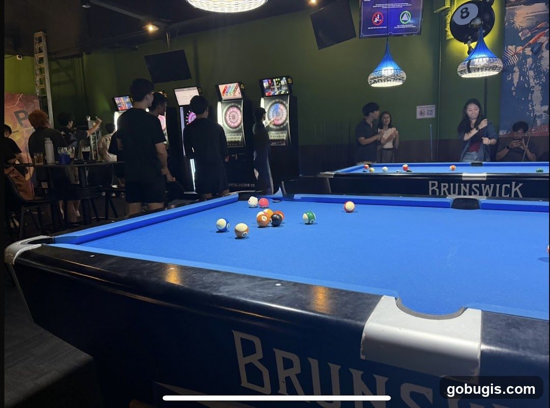 People playing pool and darts