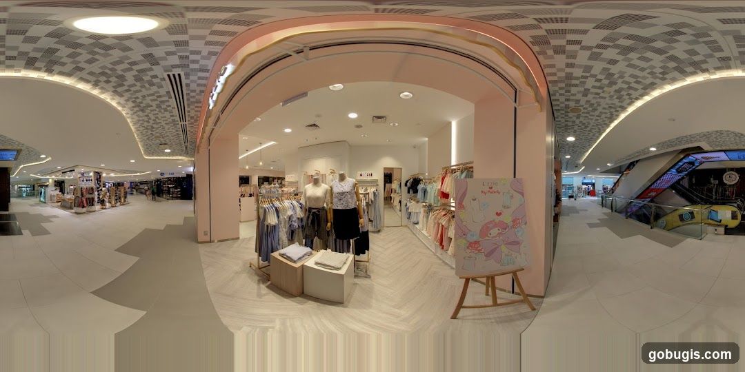 Clothing store interior with mannequins and clothing racks