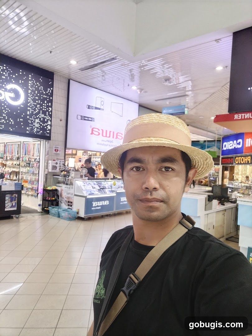 Man in Straw Hat in Store