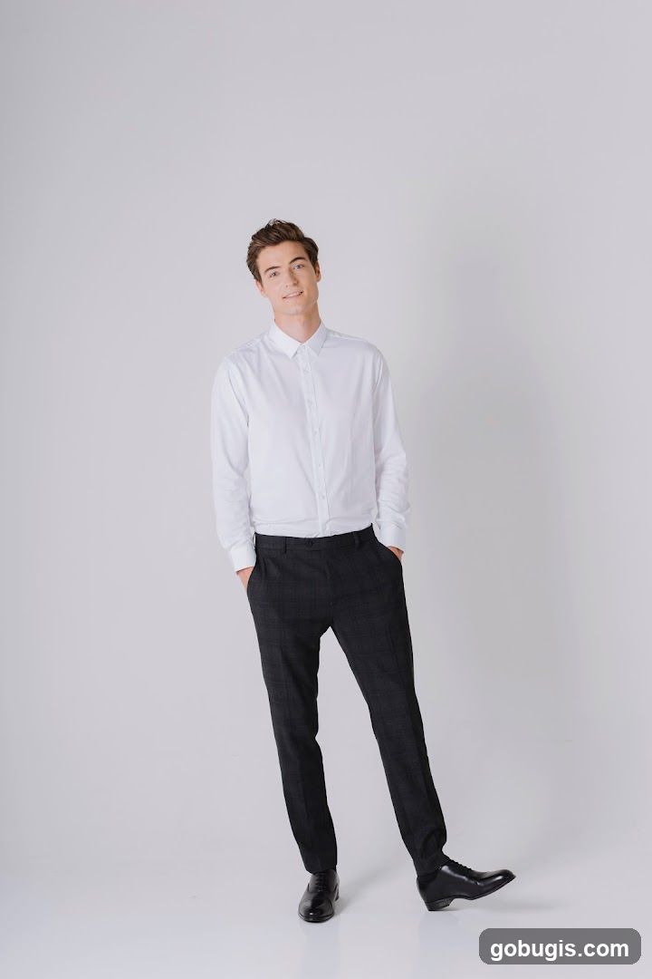 Man in White Shirt and Plaid Pants