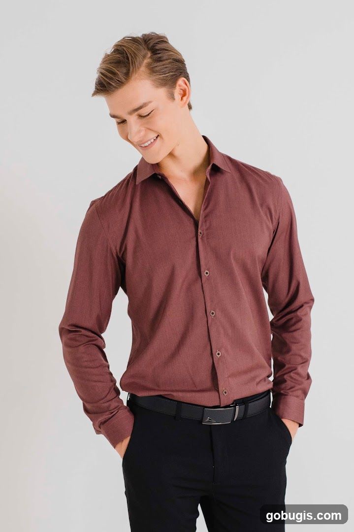 Man in Maroon Dress Shirt and Black Pants
