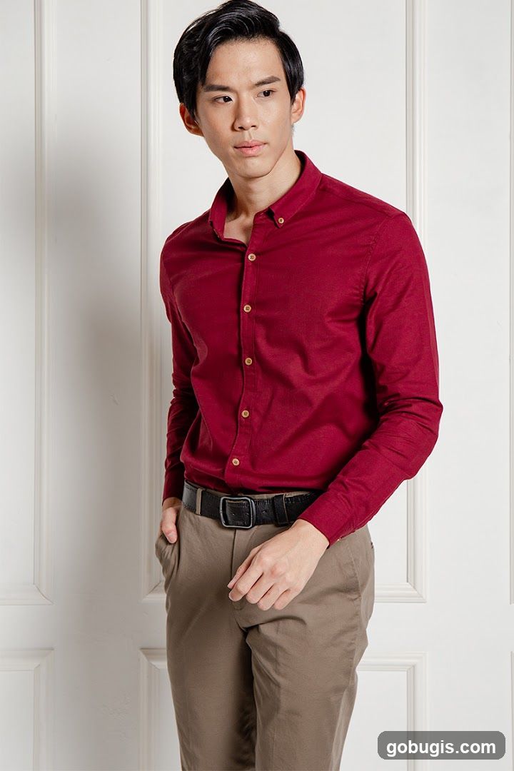 Man in Burgundy Button-Down Shirt and Khaki Pants