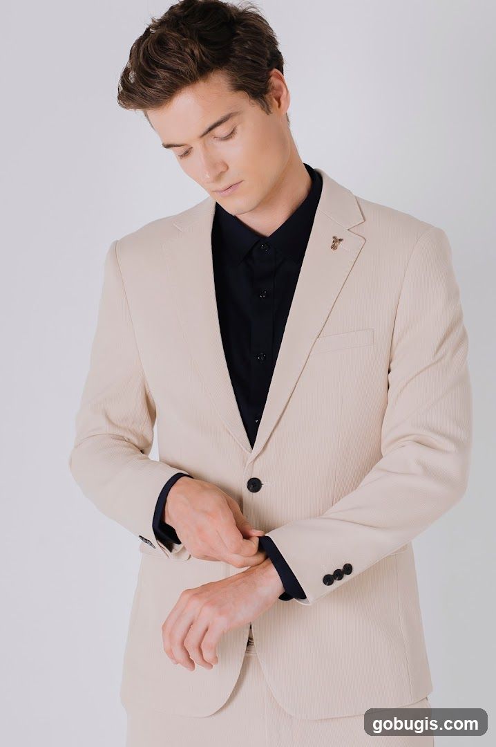 Man in a beige suit