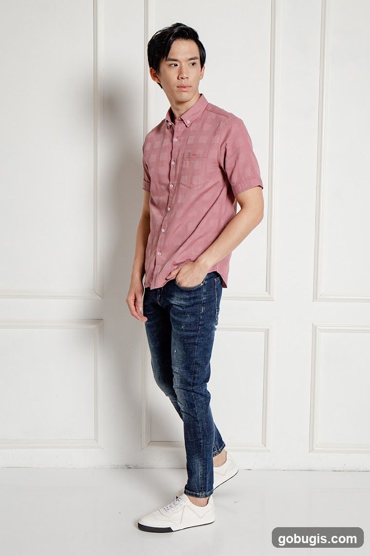 Man in Pink Shirt and Jeans