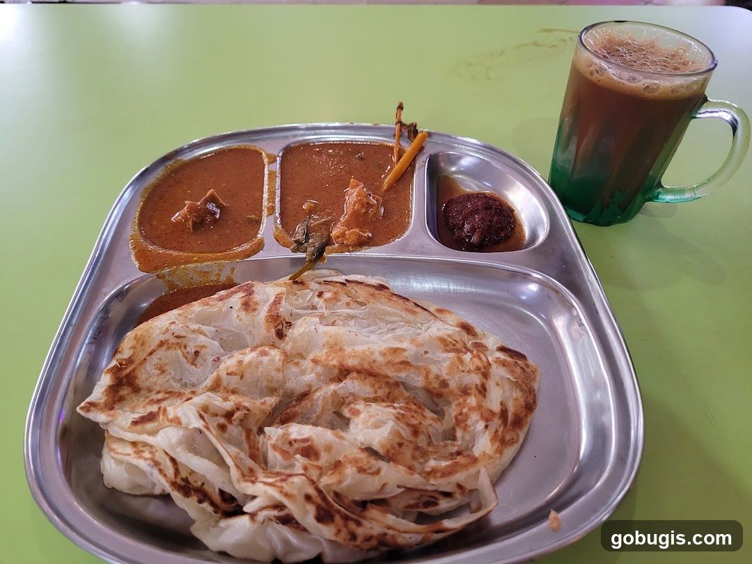 Roti Canai with Curry and Teh Tarik