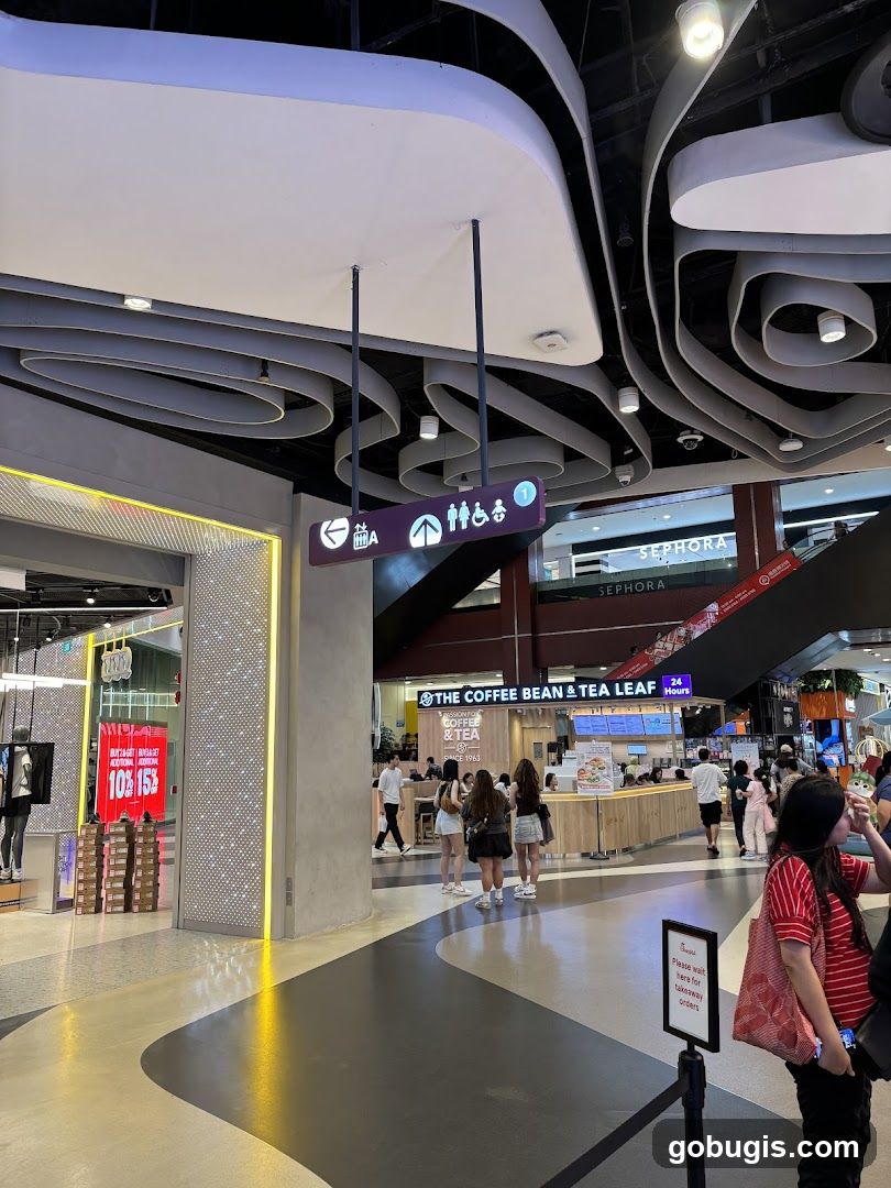 Mall Interior with Shops and Signage