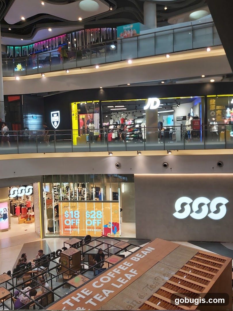 Mall Interior with Shops and Seating Area
