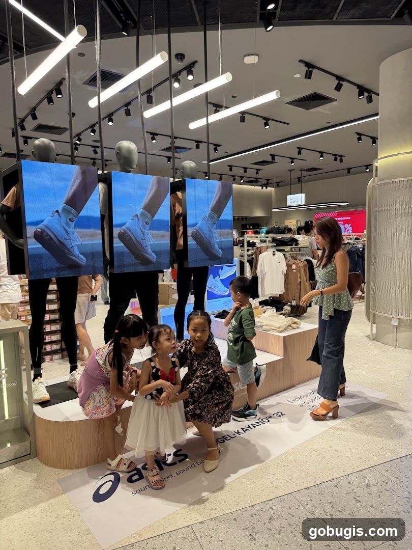 Children posing in a shoe store
