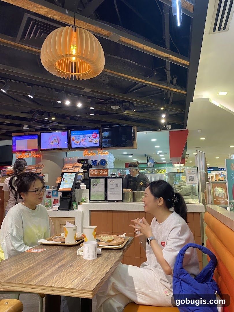 Two women dining at a fast-food restaurant